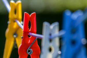 colourful plastic pegs on washing line